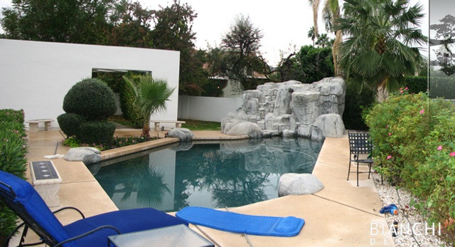 The pool as it was before had a striking geometry that matched the lines of the house, but was encumbered by contrived, artificial rock outcroppings.